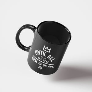 "None Of Us" Mug Black